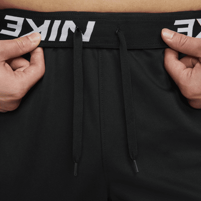 Pants Dri-FIT versátiles con dobladillo abierto para hombre Nike Totality