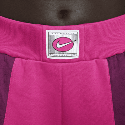 Pantalones de tejido Fleece de tiro medio para mujer Nike Sportswear Icon Clash