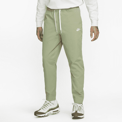 reporte recomendar piano Hombre Verde Pants. Nike US