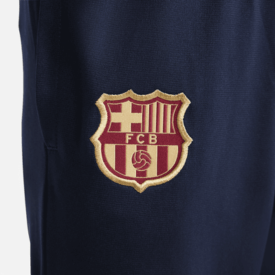 FC Barcelona Strike Nike Dri-FIT strikket fotballtracksuit til små barn