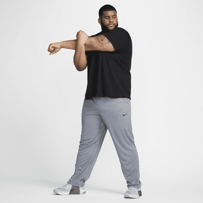 Pants Dri-FIT versátiles con dobladillo abierto para hombre Nike Totality