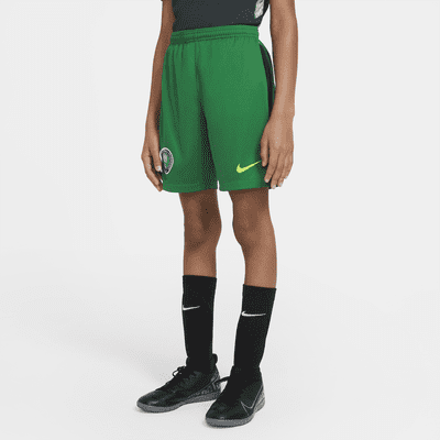 green nike football shorts