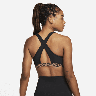 Bra deportivo con estampado de leopardo sin almohadilla de media sujeción para mujer Nike Swoosh