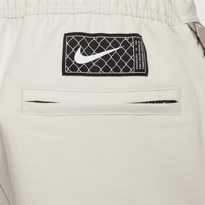 Pants de básquetbol de apertura lateral para hombre Nike