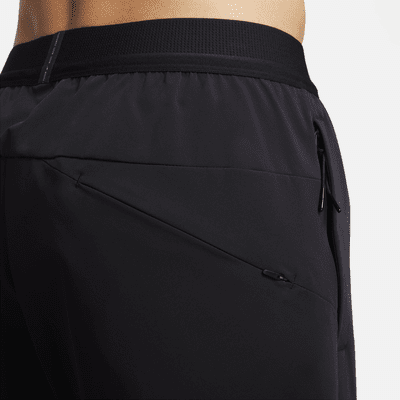 Nike A.P.S. Pants versátiles de tejido Woven Dri-FIT para hombre