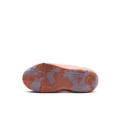 Nike Team Hustle D 12 Tenis para niños de preescolar