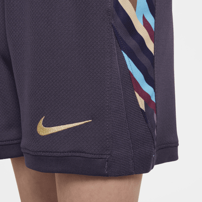 Tredelat fotbollsställ England 2024/25 Stadium (bortaställ) Nike Replica för barn