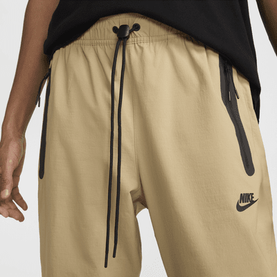Męskie spodnie z tkaniny Nike Tech