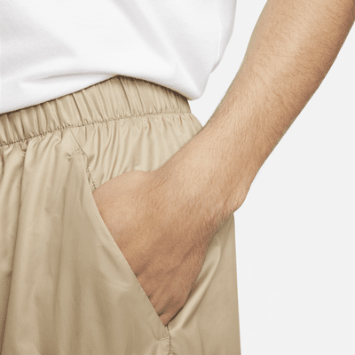 Pantaloni in tessuto con fodera Nike Tech – Uomo