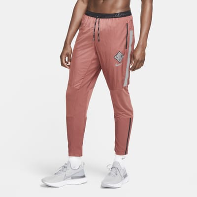 pantaloni nike uomo arancione