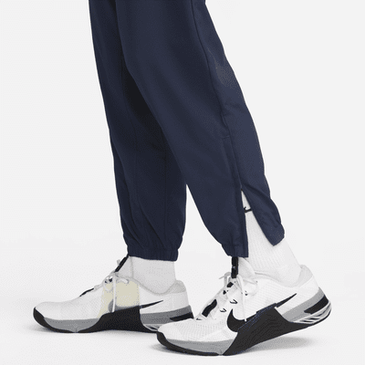 Pants Dri-FIT entallados versátiles para hombre Nike Form