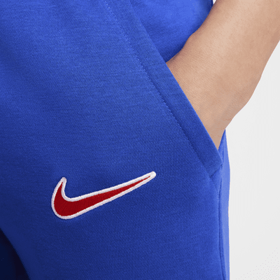 Atlético Madrid Club Thuis Nike voetbaljoggingbroek van sweatstof voor jongens