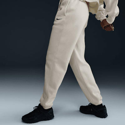 Pants de entrenamiento oversized de tiro alto para mujer Nike Sportswear Phoenix Fleece