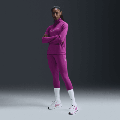 Nike Fast Leggings de running de 7/8 de talle medio con bolsillos - Mujer