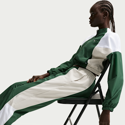 Damskie spodnie dresowe o kroju oversize ze średnim stanem Nike Sportswear