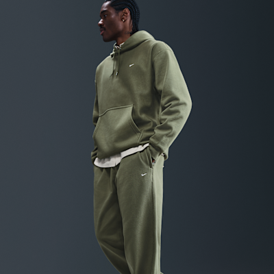 Pants de tejido Fleece con puños para hombre Nike Solo Swoosh