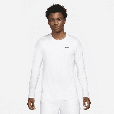 NikeCourt Dri-FIT Advantage Camiseta de tenis con media cremallera - Hombre.  Nike ES