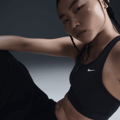 Dámská sportovní podprsenka s vycpávkami Nike Swoosh se zipem vpředu a střední oporou