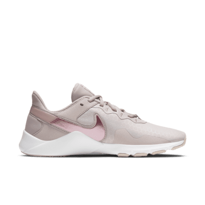 nike pink legend trainers