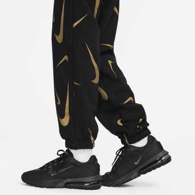 Joggers de tejido Fleece con estampado de tiro alto para mujer Nike Sportswear