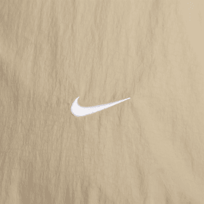 Chamarra de entrenamiento de tejido Woven para hombre Nike Sportswear Solo Swoosh