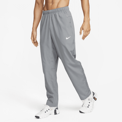 Pants Dri-FIT versátiles con dobladillo abierto para hombre Nike Form