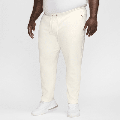 Pants Dri-FIT entallados versátiles con protección UV para hombre Nike Primary