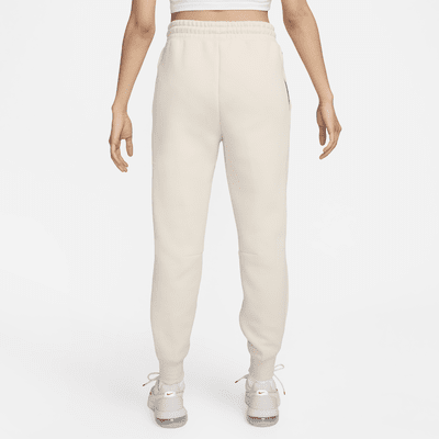 Pantaloni jogger a vita media Nike Sportswear Tech Fleece – Donna