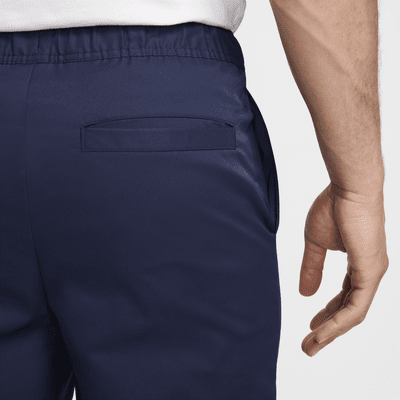 Pants entallados de tejido Woven para hombre Nike Club