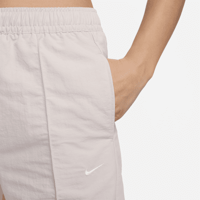 Pants de tiro medio con dobladillo abierto para mujer Nike Sportswear Everything Wovens