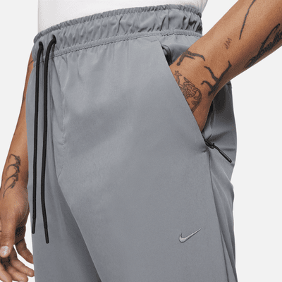 Pants versátiles Dri-FIT de pierna entallada para hombre Nike Unlimited