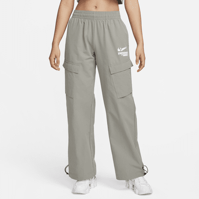 Nike World Tour Pack graphic woven cuffed cargo joggers in pink