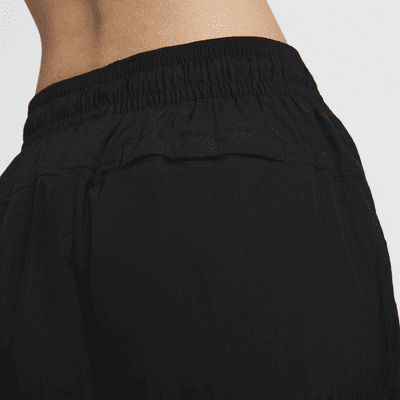 Pantalon à zip taille mi-haute déperlant Nike Sportswear Collection pour femme