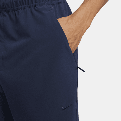 Pants versátiles Dri-FIT de pierna entallada para hombre Nike Unlimited