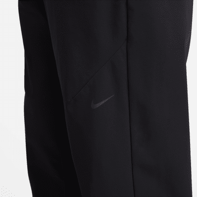 Nike A.P.S. Pants versátiles de tejido Woven Dri-FIT para hombre