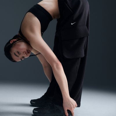 Pants de French Terry de tiro bajo oversized con dobladillo abierto para mujer Nike Sportswear