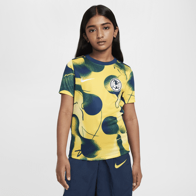 Playera de fútbol de manga corta Nike Dri-FIT para antes del partido para niño talla grande Club América Academy Pro