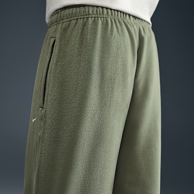 Pants de tejido Fleece con puños para hombre Nike Solo Swoosh