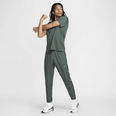 Pantaloni da running in tessuto Dri-FIT Nike Challenger – Uomo