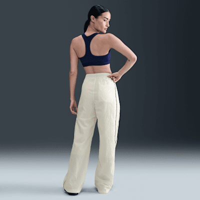 Pants con dobladillo abierto de tejido Woven de tiro alto para mujer Nike Windrunner