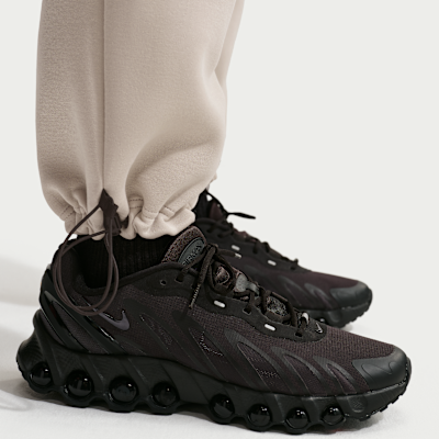 Pantalones de tejido Fleece con dobladillo abierto y colores contrastantes Nike Tech para hombre