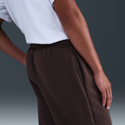 Męskie spodnie do koszykówki ze szczotkowanej dzianiny z luźnymi nogawkami Therma-FIT Nike Standard Issue