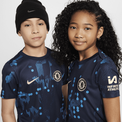 Camisola de futebol de manga curta do equipamento de aquecimento Nike Dri-FIT Academy Pro Chelsea FC Júnior