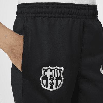 FC Barcelona Strike Nike Dri-FIT strikket fotballtracksuit til små barn