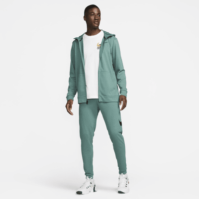 Träningsbyxor Nike Dry Dri-FIT i avsmalnande modell med tryck för män