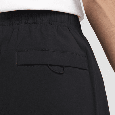 กางเกงขายาวทรงเปิดชายแบบทอผู้ชาย Nike Tech