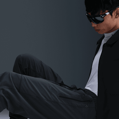 Pantaloni in tessuto Nike Tech – Uomo