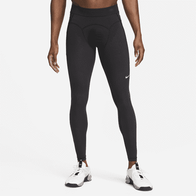 Black downjacket and shiny blue Nike leggings - Spandexplanet.com