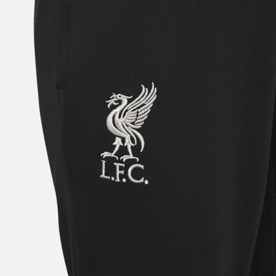 Pantaloni da calcio in maglia Nike Dri-FIT Liverpool FC Strike – Ragazzo/a