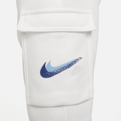 Pantaloni cargo in fleece con grafica Nike Sportswear – Ragazzo